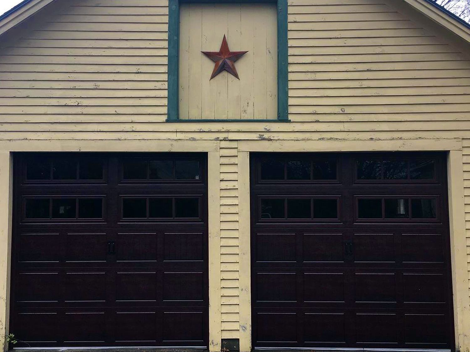 A garage with a star on the top of it