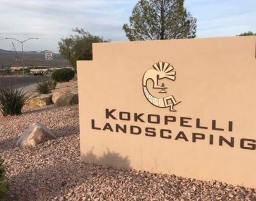 A sign that says kokopelli landscaping on it