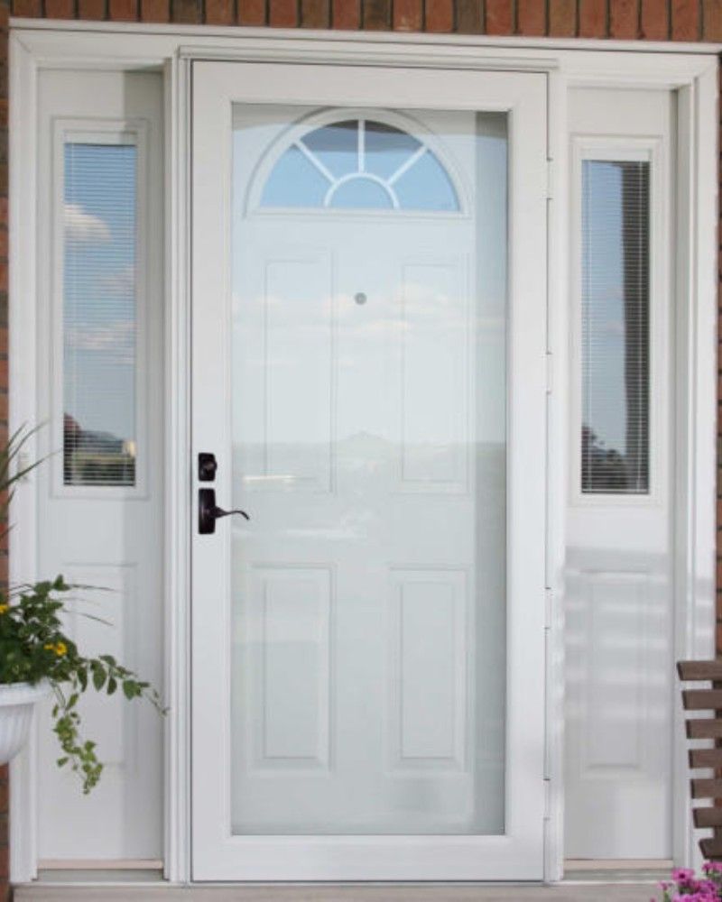 A white door with a sliding glass door