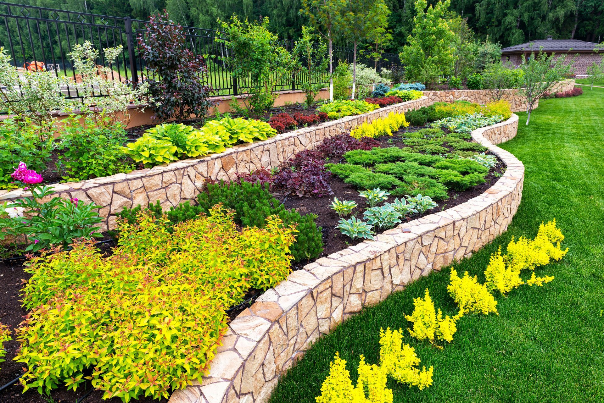 Why You Should Hire Year-Round Landscaping Services