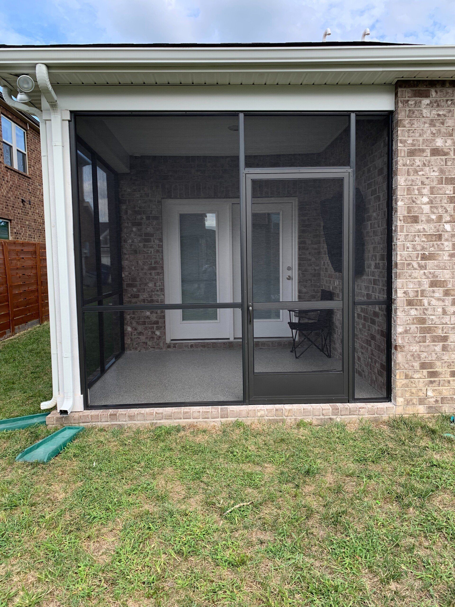 house exterior with enclosure