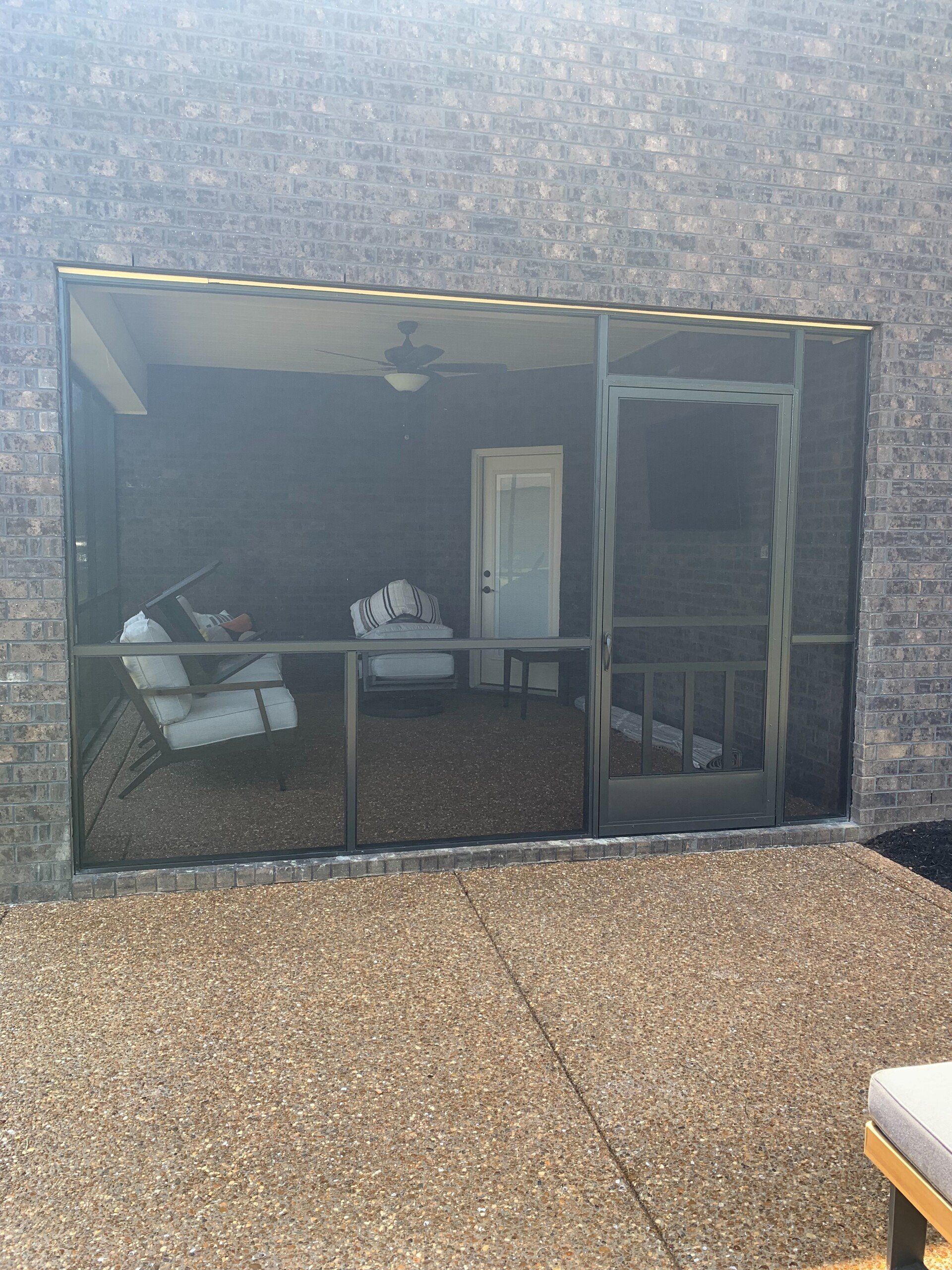 brick wall with screen window