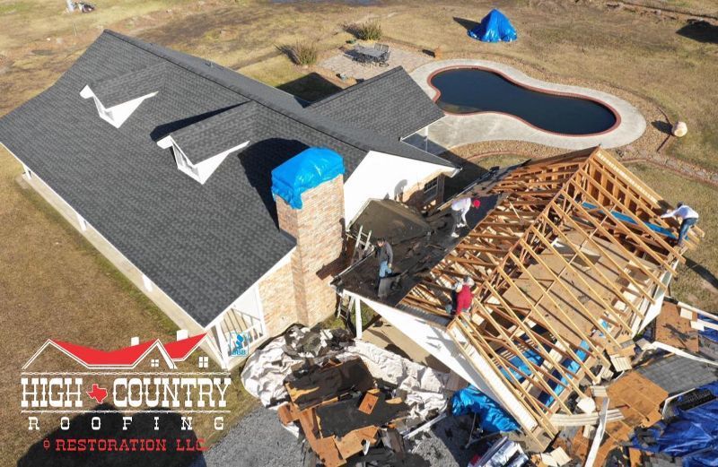 An aerial view of a house being built by high country roofing