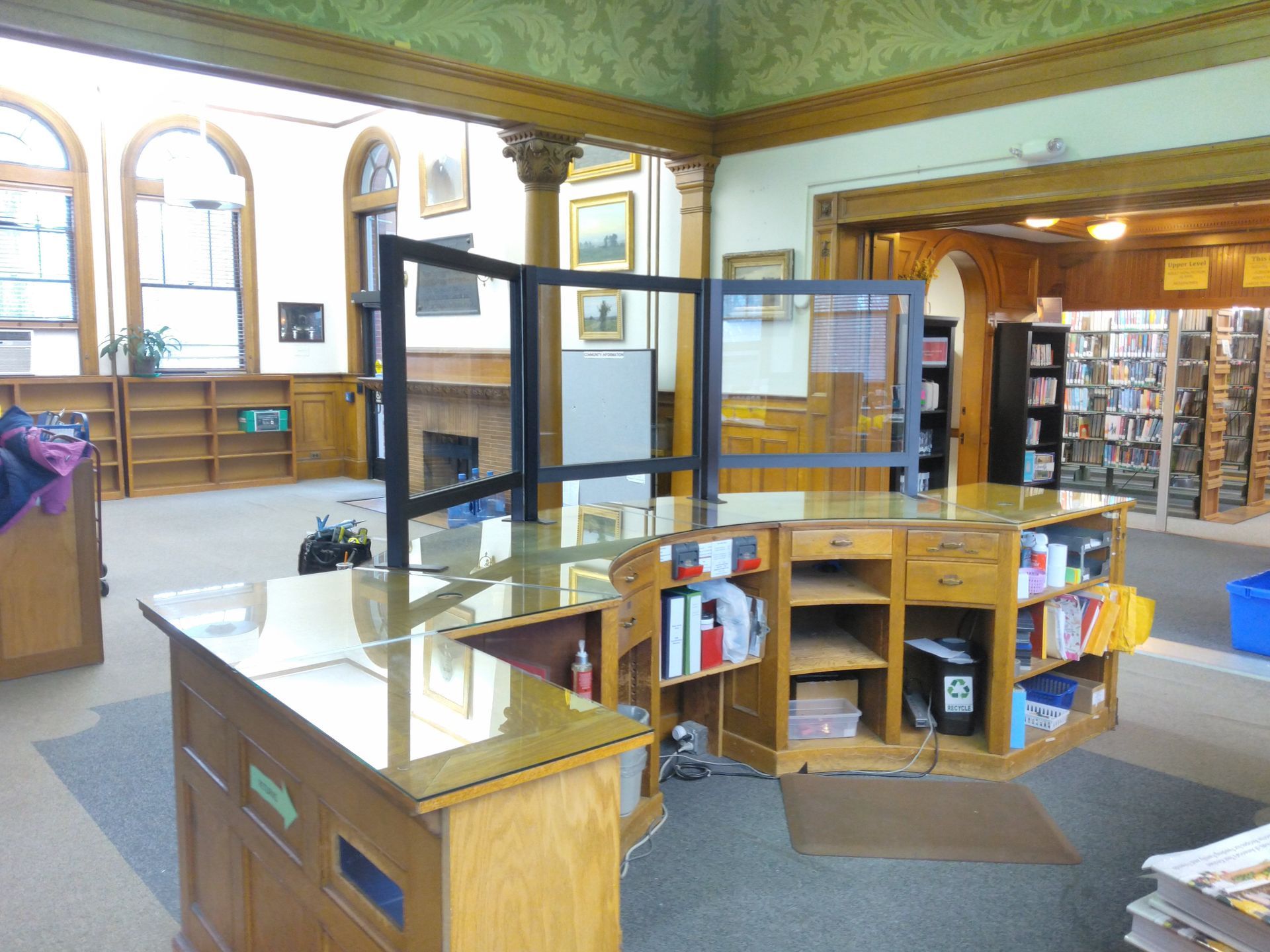 A library with a counter and shelves filled with books