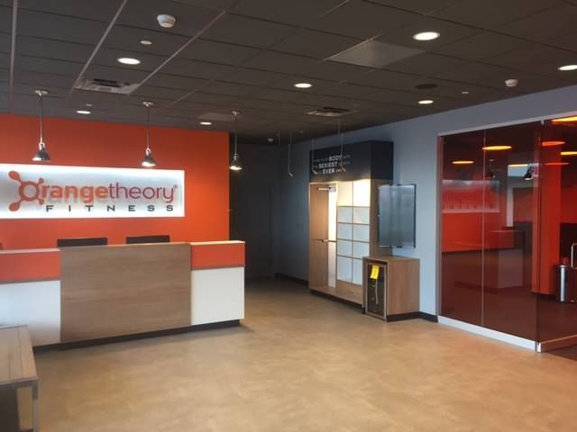 The inside of an orange theory fitness gym