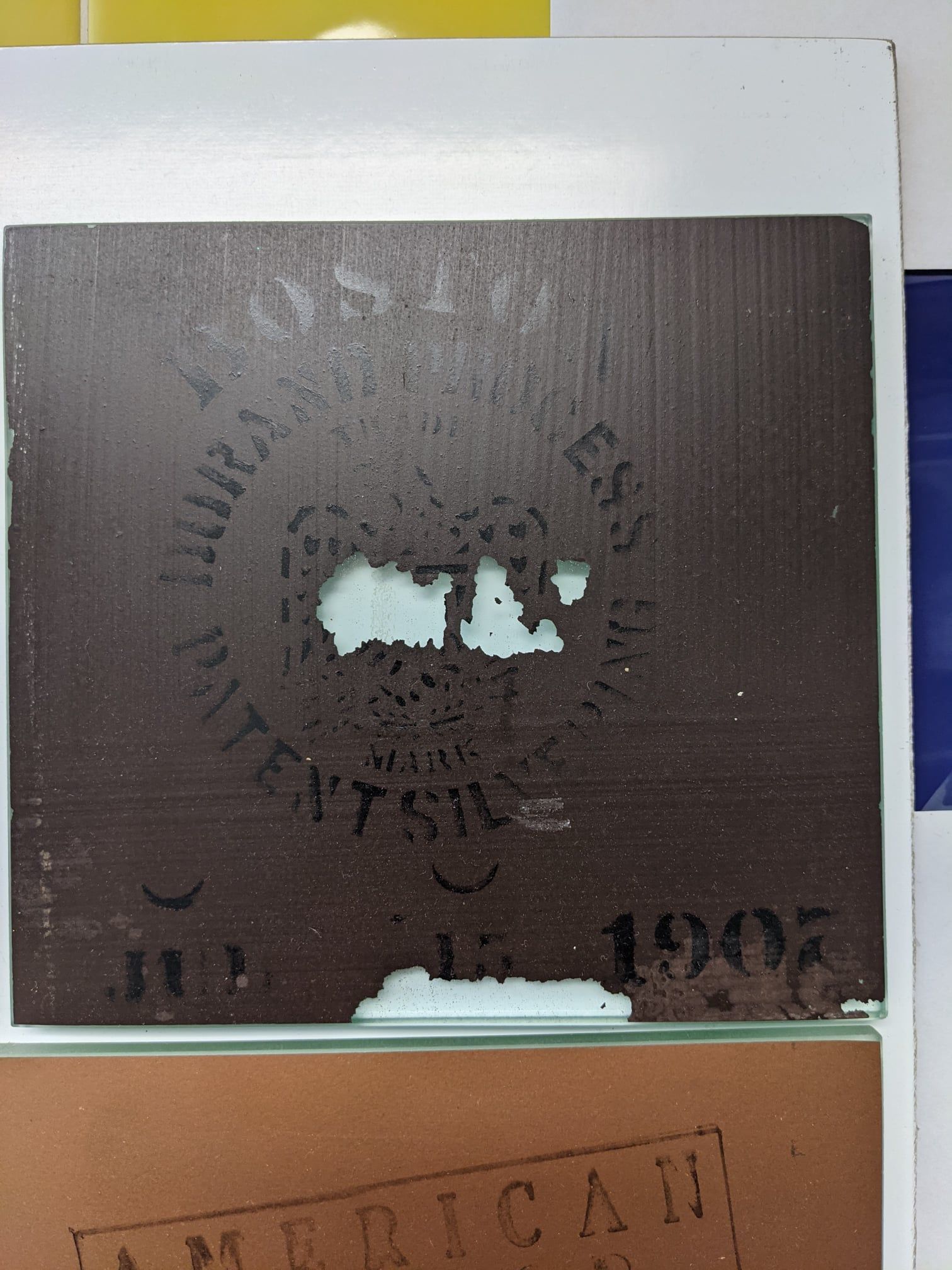 A brown piece of paper with the year 1906 on it