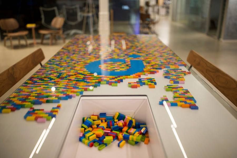 A table with a lot of lego blocks on it