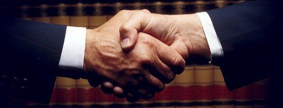 Close up of a handshake
