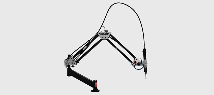 Black articulated desk lamp with a flexible arm and clamp base on a white background
