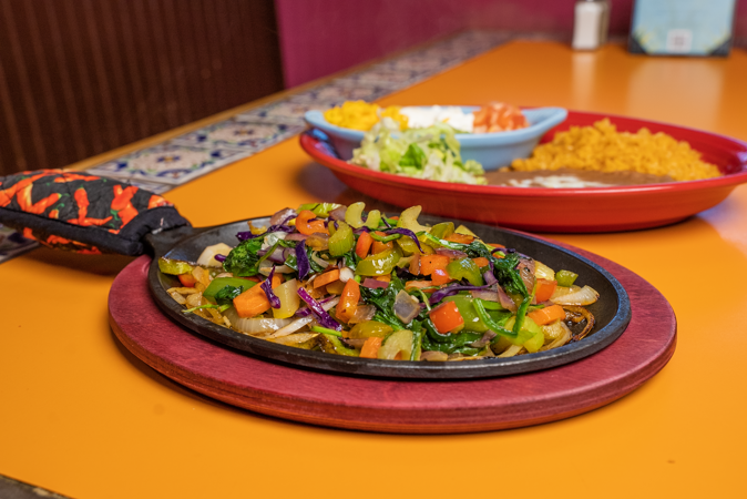 A close up of a plate of food on a table.