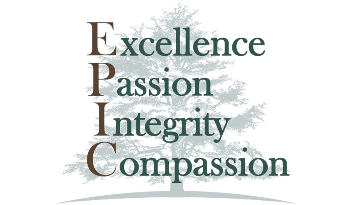 A logo for excellence passion integrity compassion with a tree in the background.