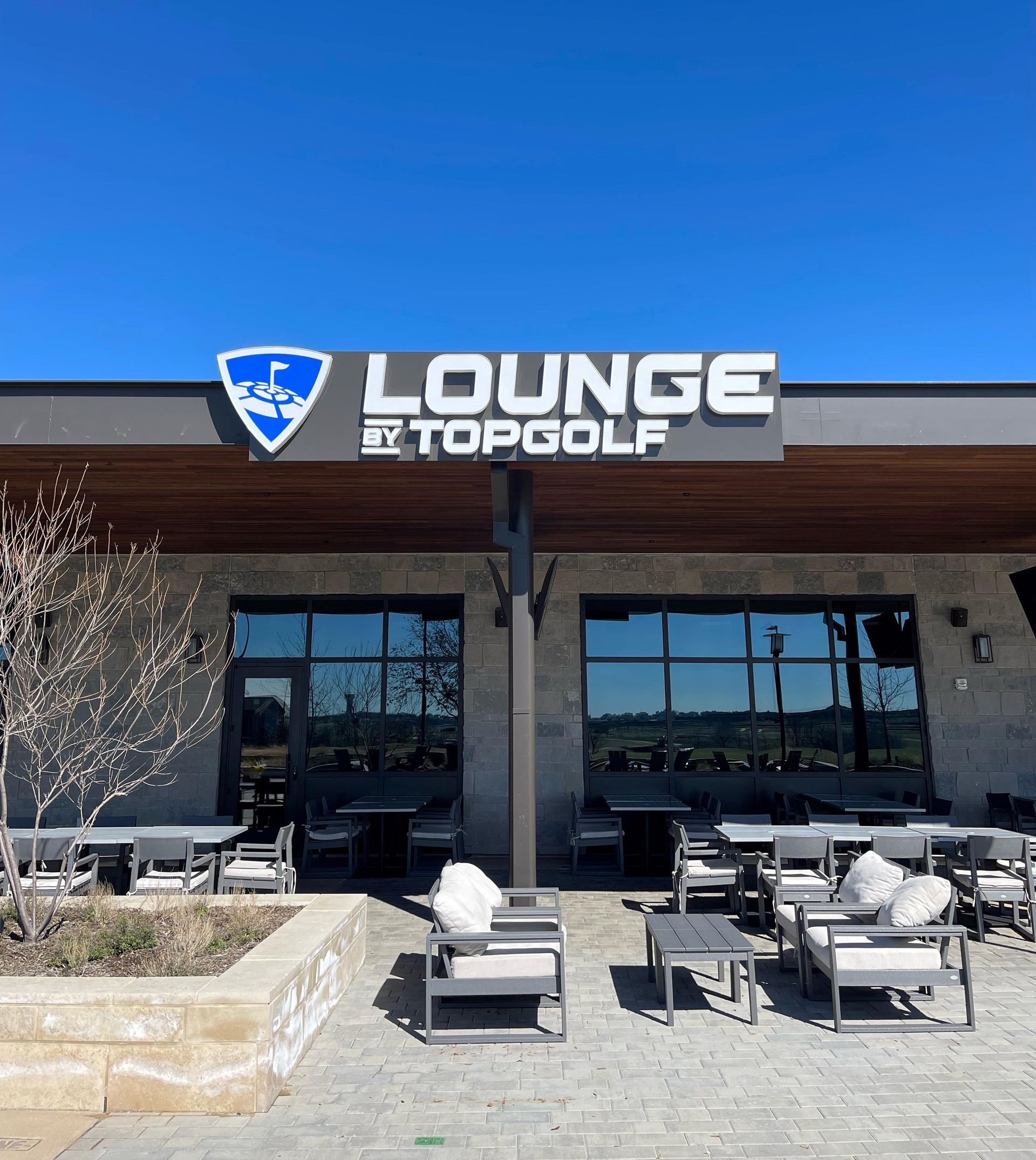 Front-lit channel letters and logo sign for Lounge by Topgolf.