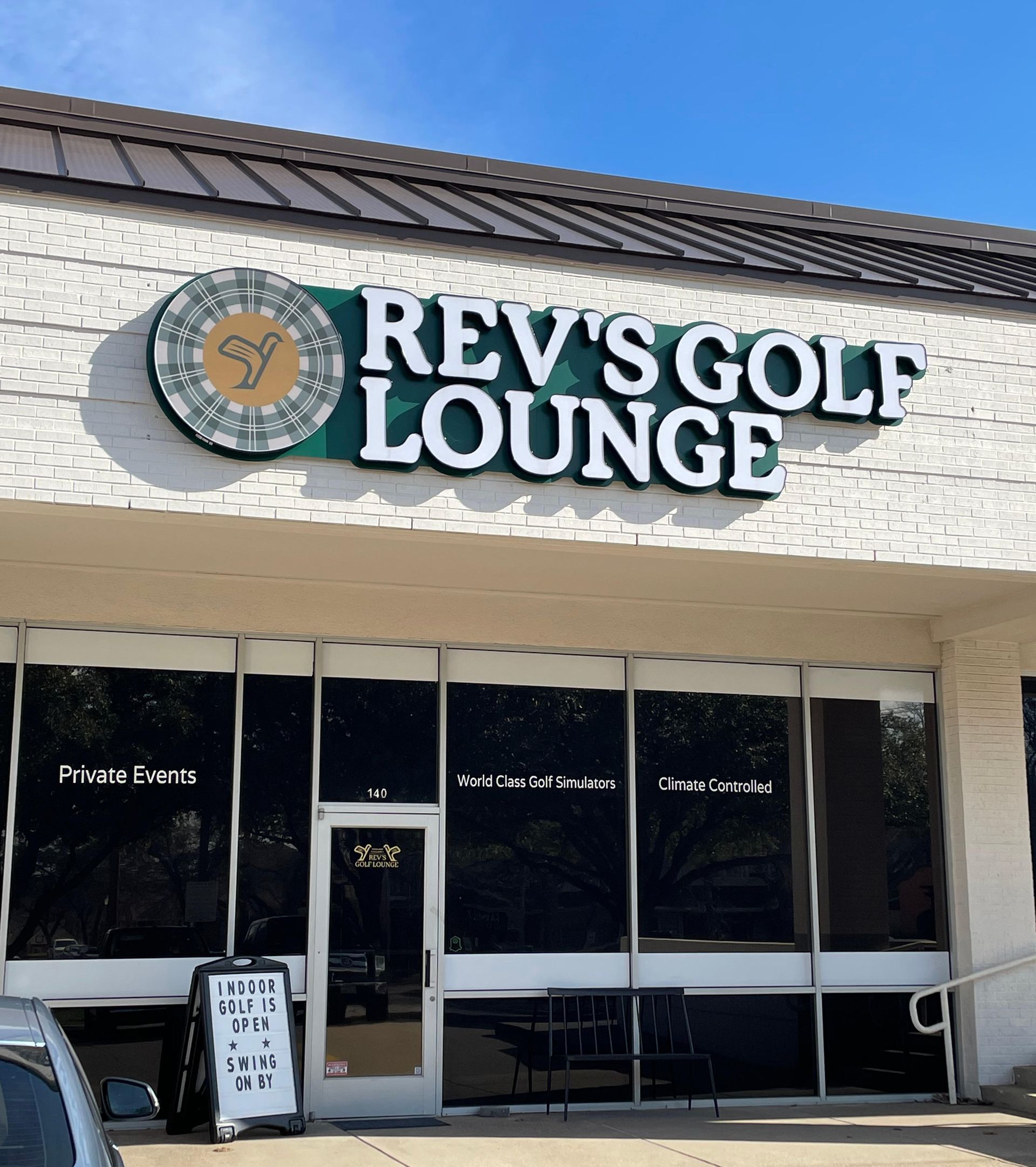 Front-lit channel letter sign on a shape-cut backplate for Rev’s Golf Lounge in Highland Village, TX.