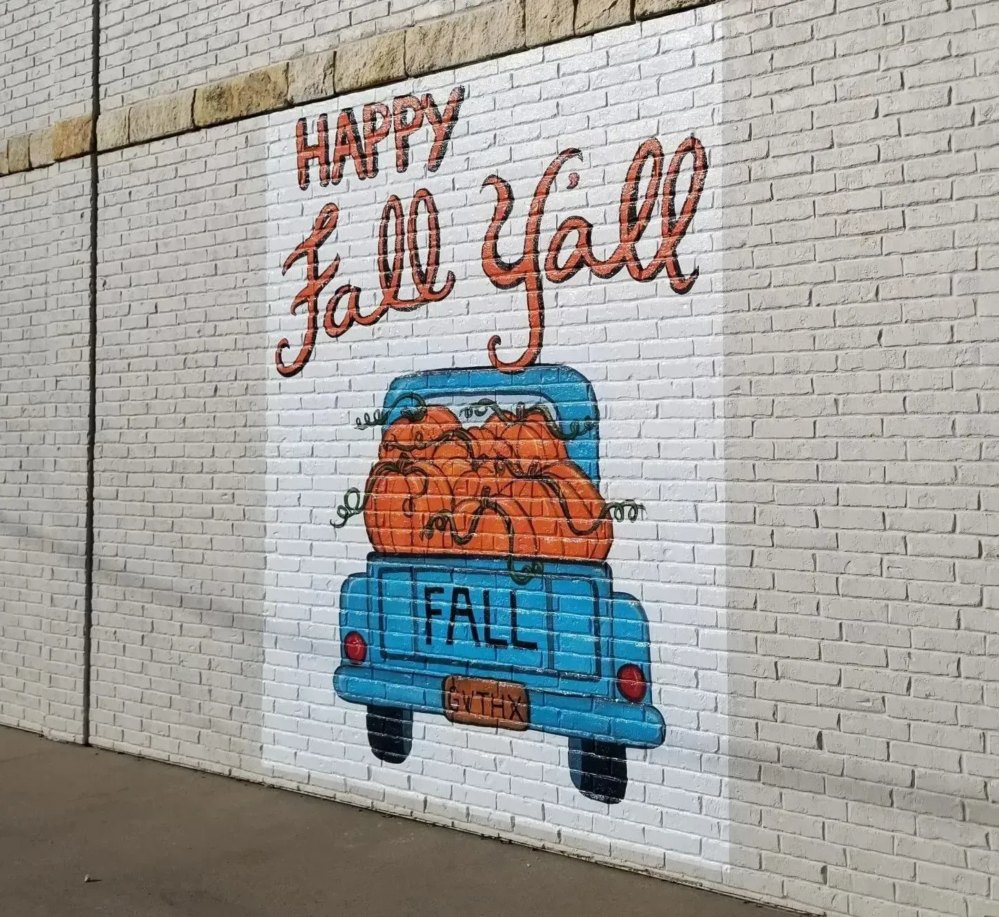 Mural on brick wall: 