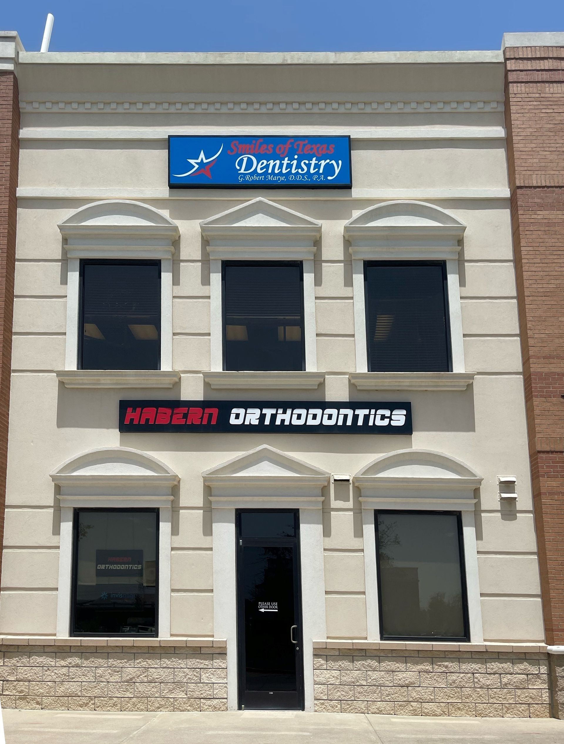 Custom cabinet sign for Smiles of Texas Dentistry in Bartonville, TX.
