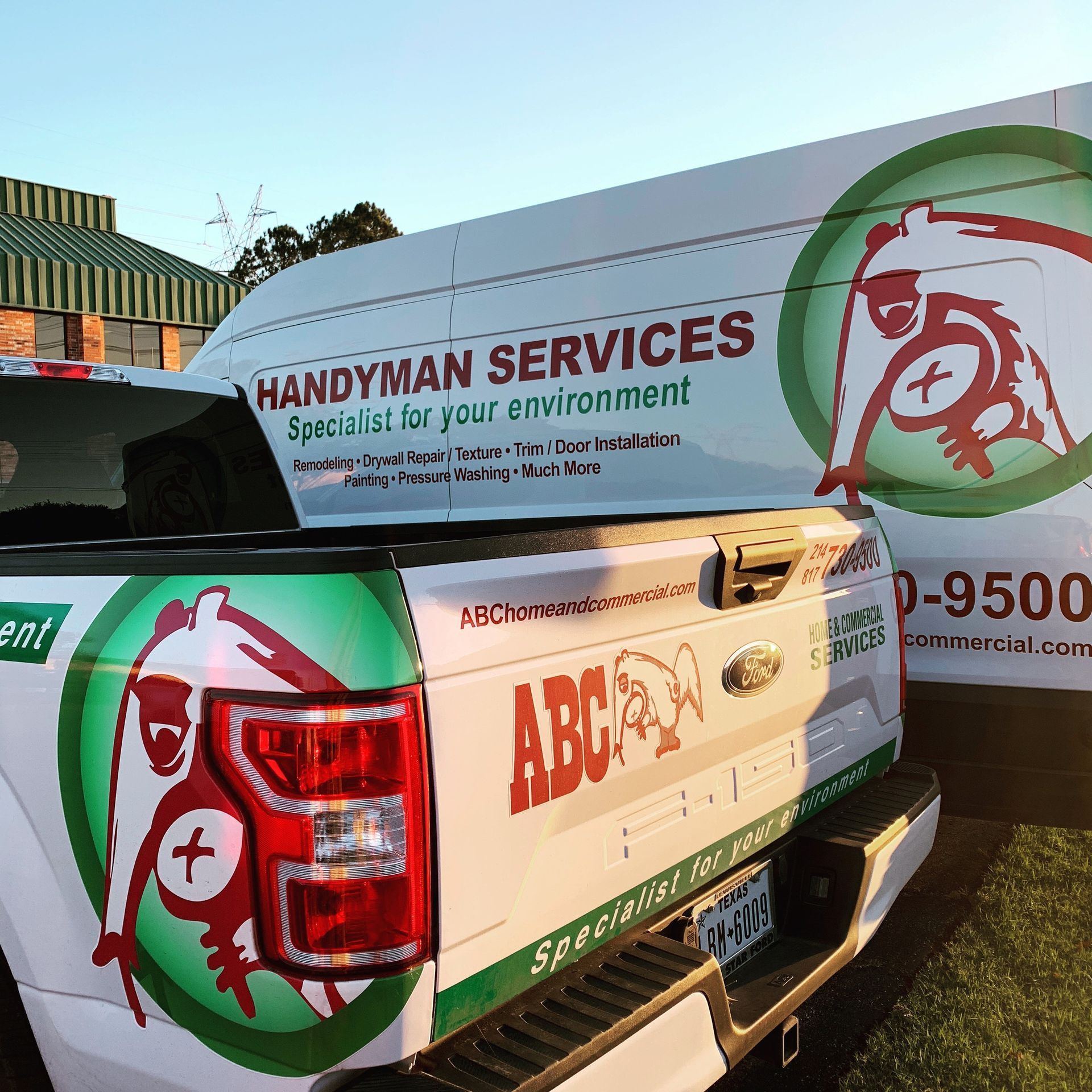 White ABC Handyman Services truck and van with logo and contact info. Green and red accents.