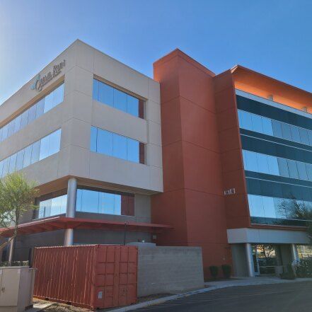 a large building with a lot of tinted windows