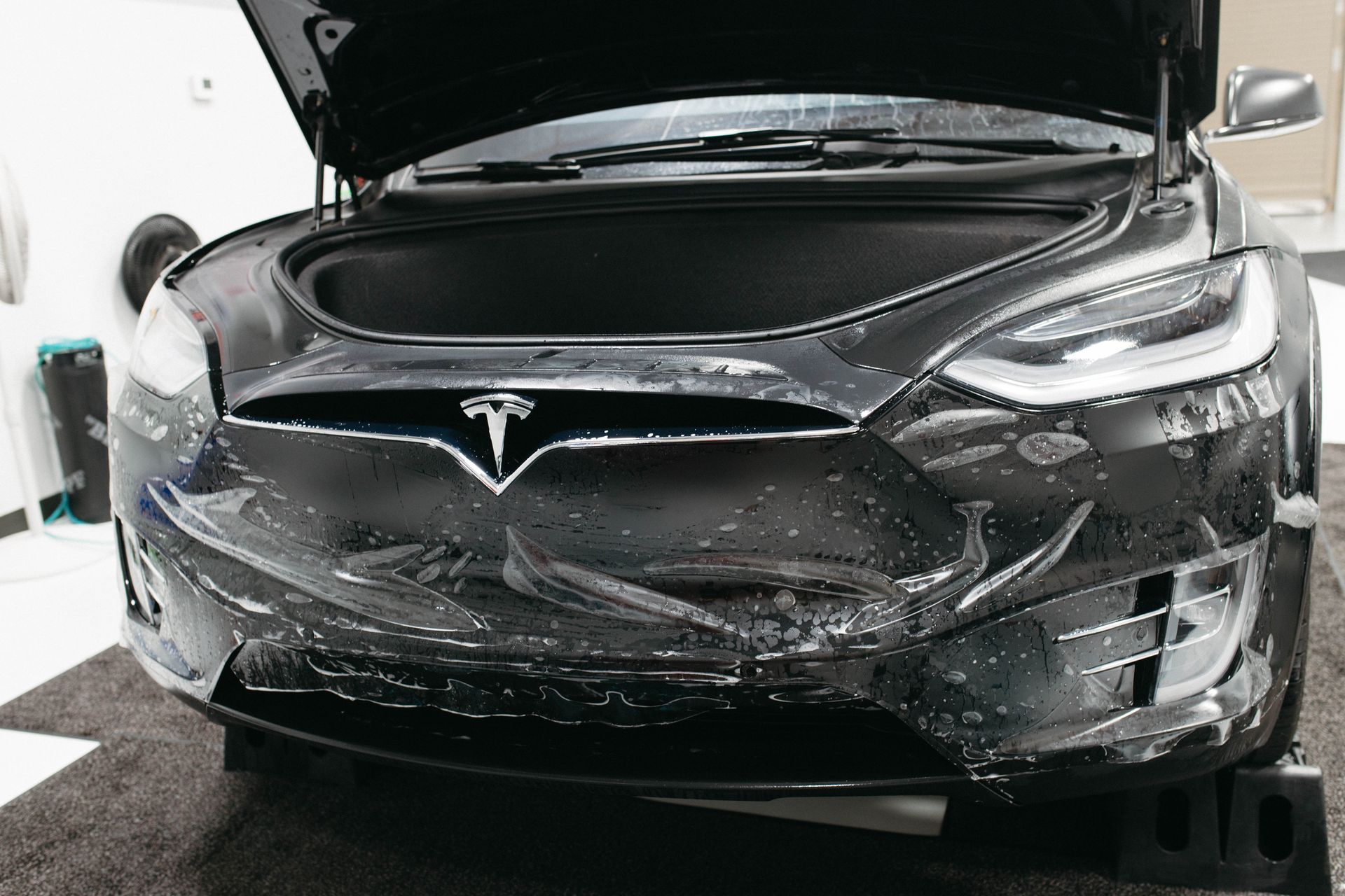 application of protective film on a black tesla