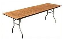 Long rectangular wooden folding table with metal legs.
