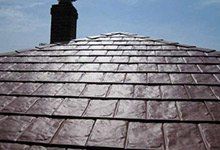 Metal shingle roofing