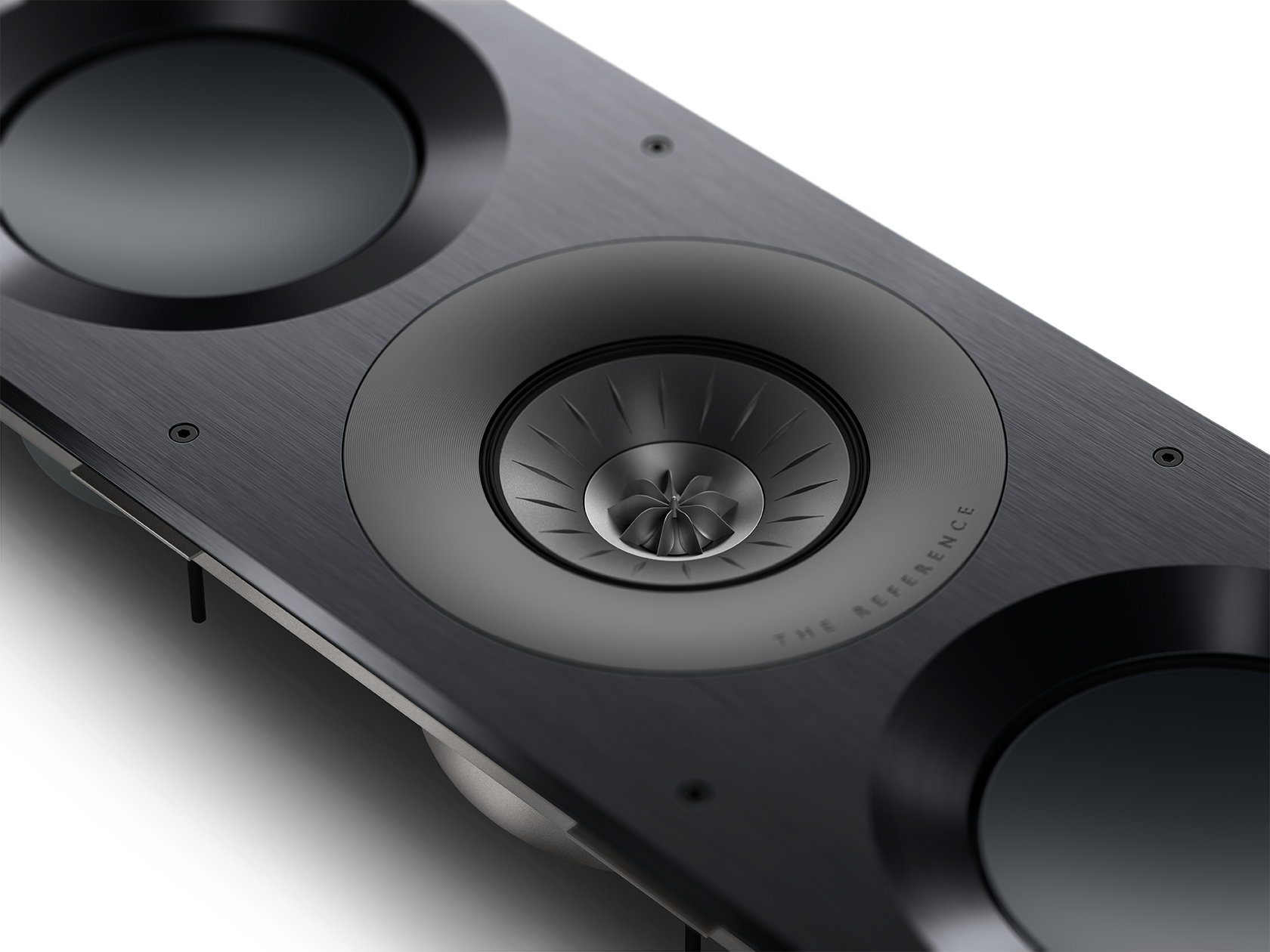 A home theater with two couches and a projector screen