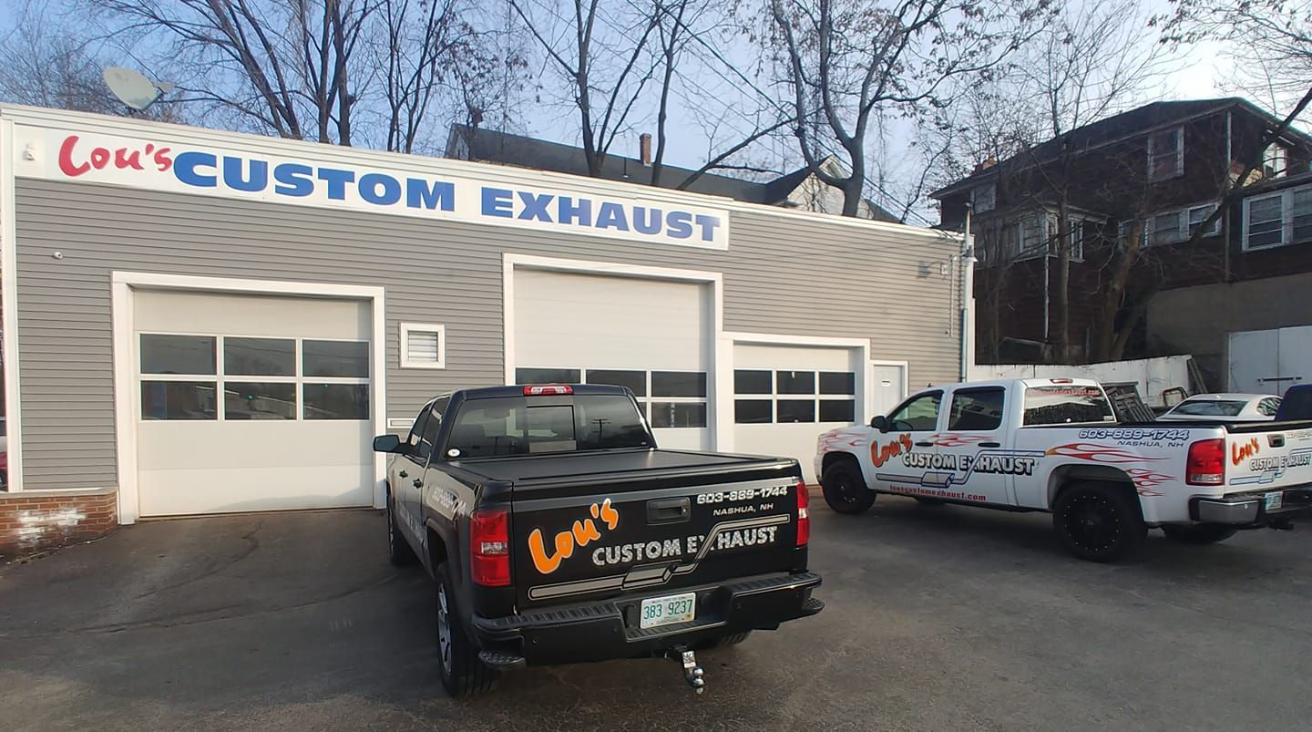 Lou's Custom Exhaust Shop with service vehicle