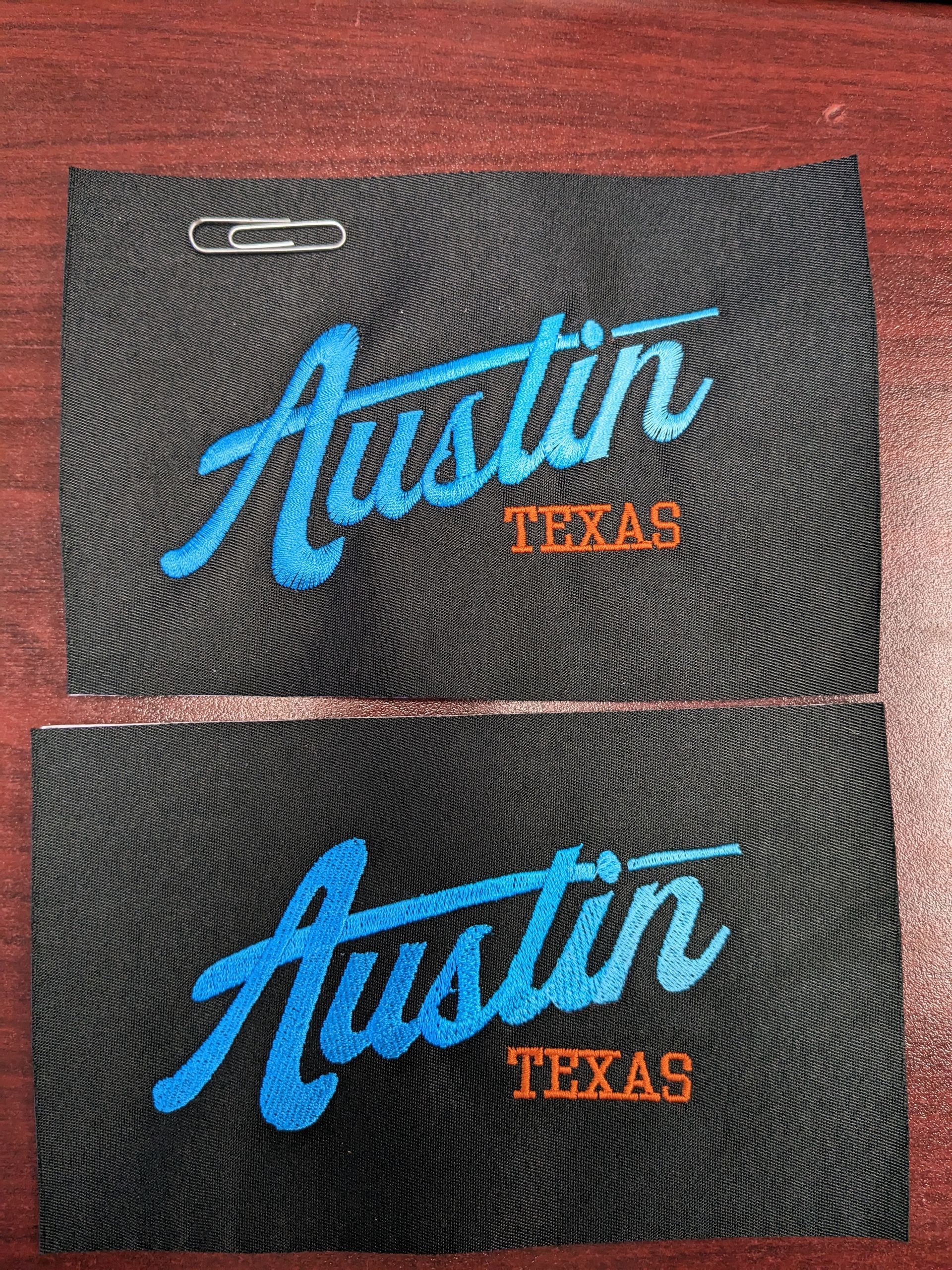 Two pieces of fabric with the word austin texas embroidered on them.