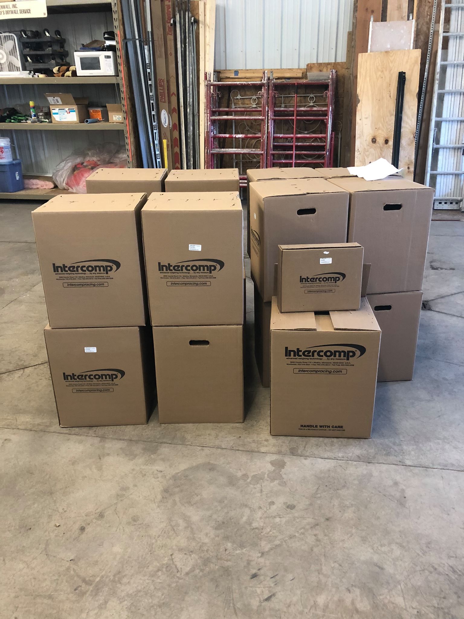 Boxes of various sizes, mostly brown, with 