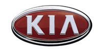 Kia logo with silver border, red background, and white
