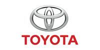 Toyota logo with a silver emblem and red text.
