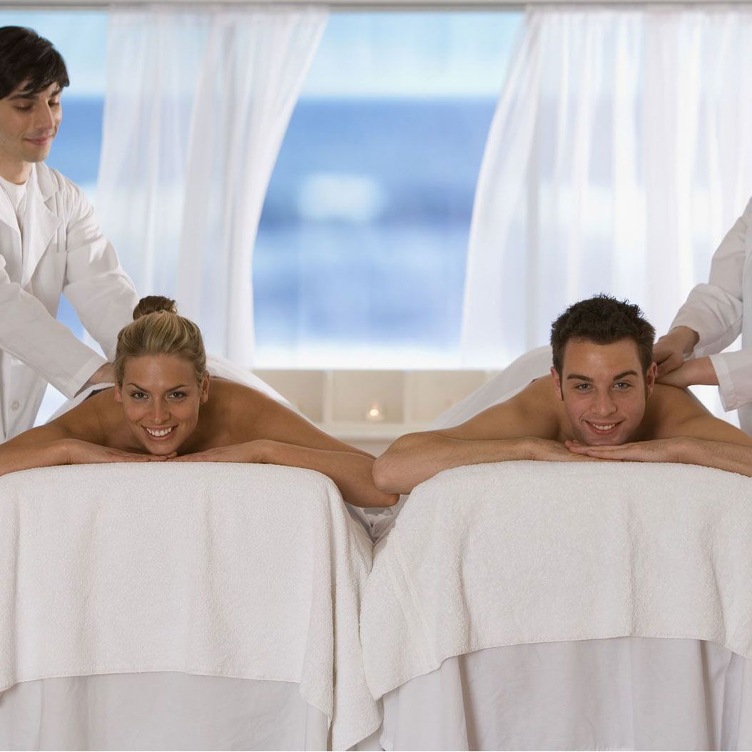 A man and woman having a relaxing aromatherapy massage