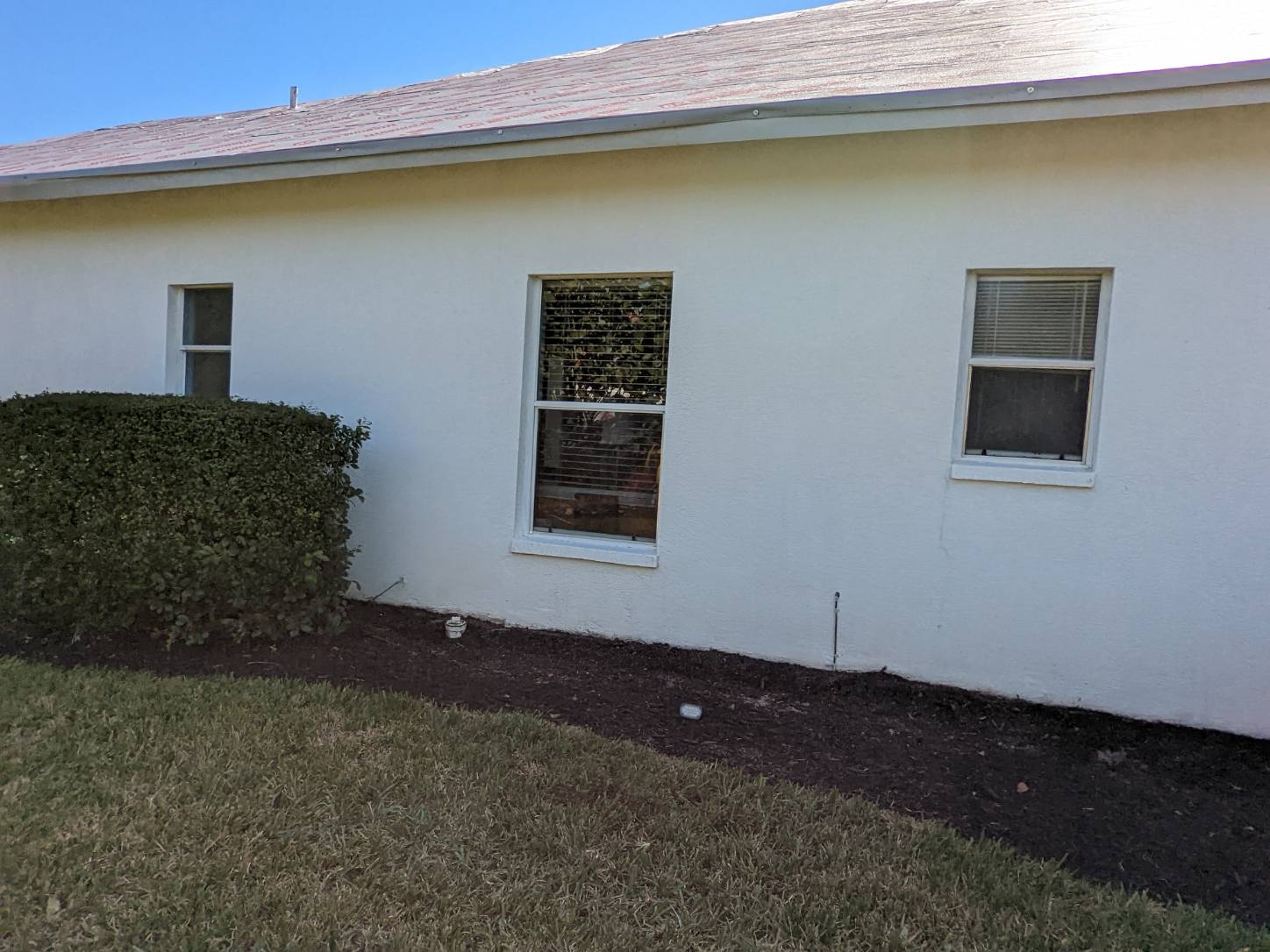 side of house after pressure washing