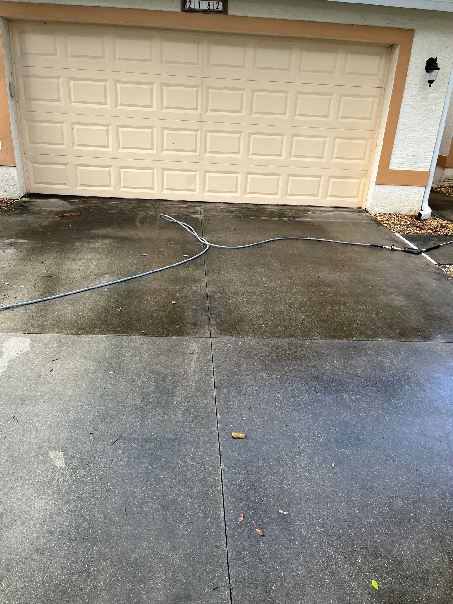 Driveway before pressure washing