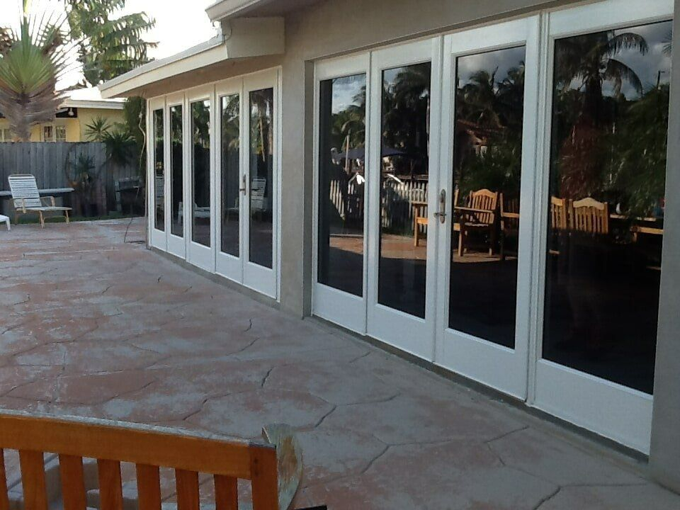 a patio with sliding glass doors