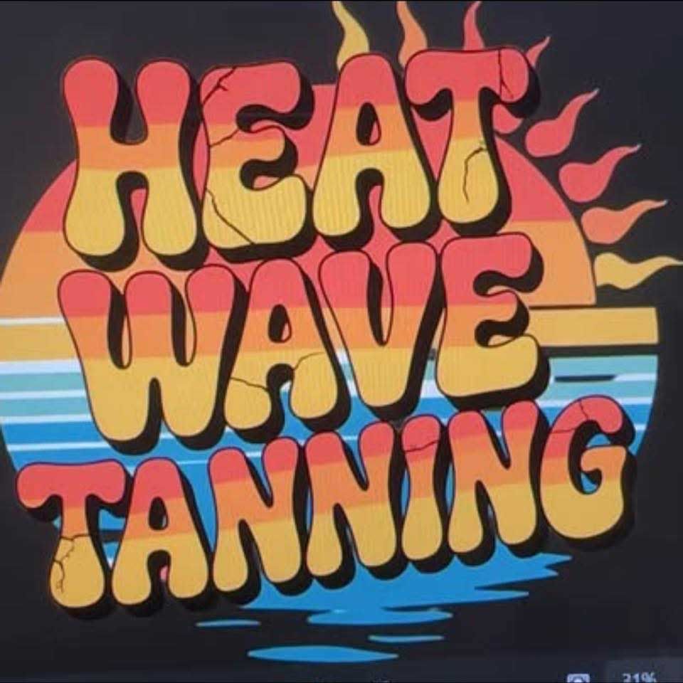 Logo for Heat Wave Tanning: orange, yellow, and red text over a sunset and water design.
