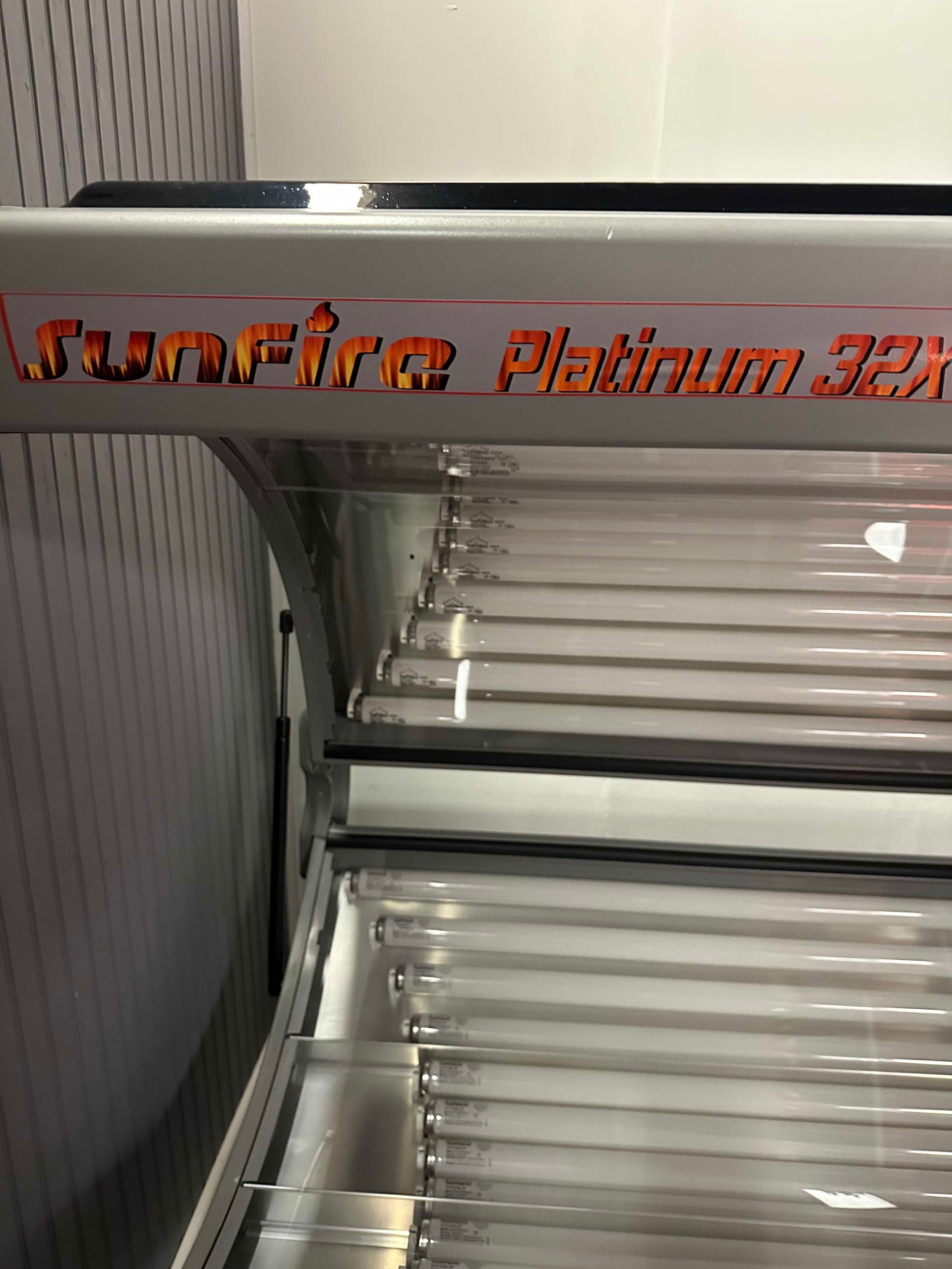 A Sunrise Platinum 32K tanning bed with fluorescent bulbs.