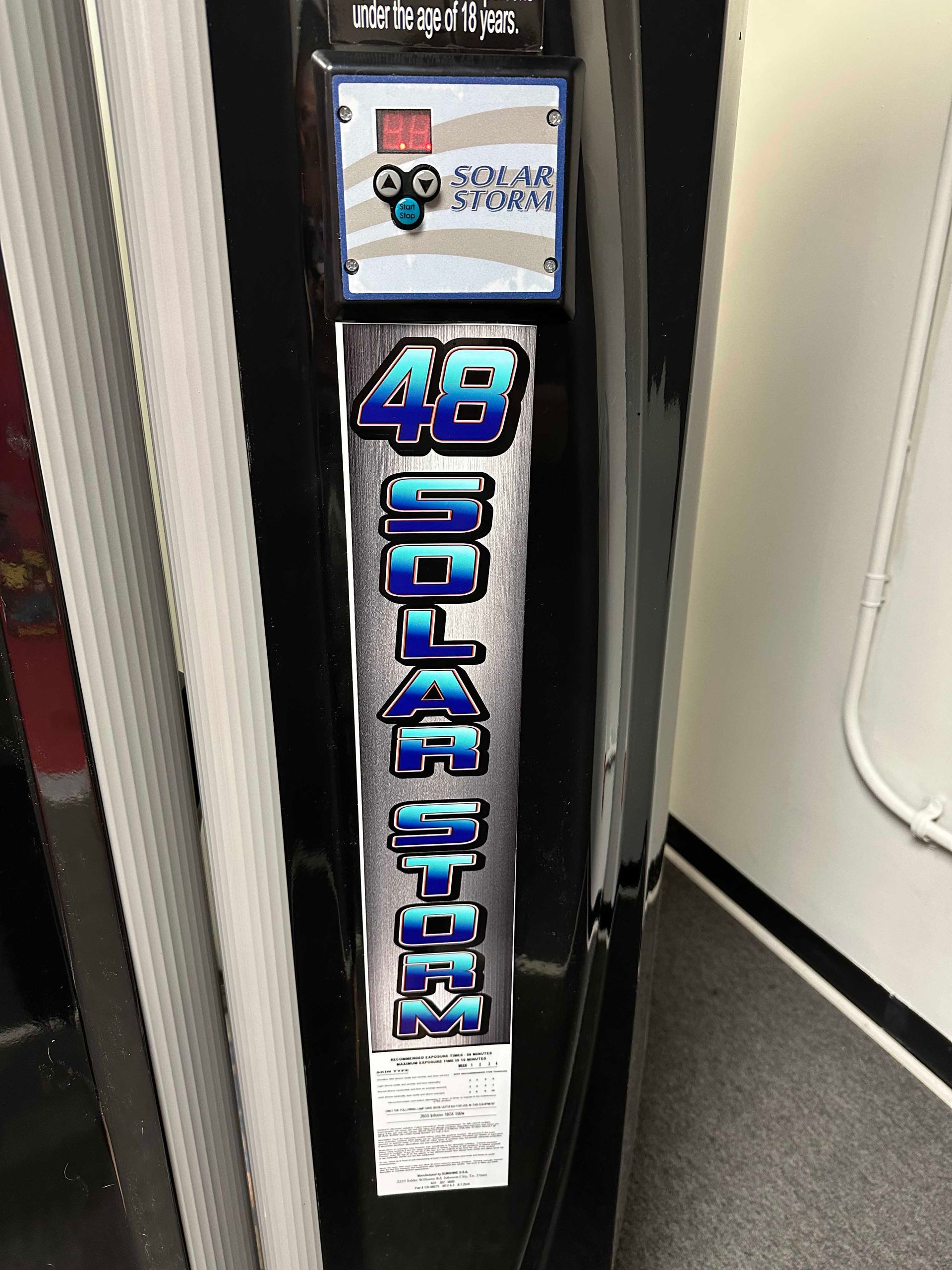 A black vending machine displaying 