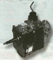 Small black mechanical device with a clear top cover and a protruding wire, shown on a white background