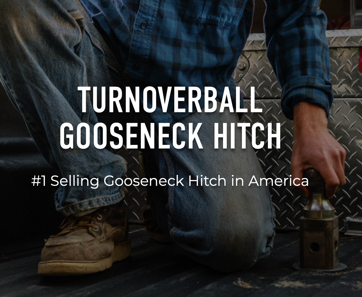 A man is kneeling down to install a turnoverball gooseneck hitch