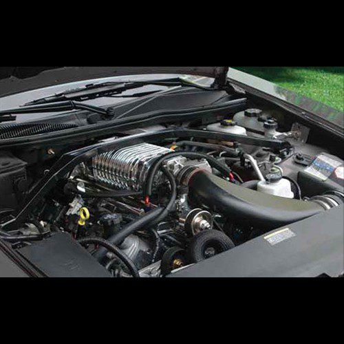 A close up of a car engine with the hood open.