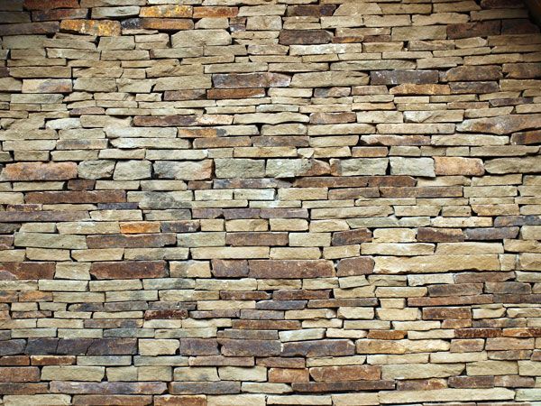 A brick wall with a lot of bricks on it