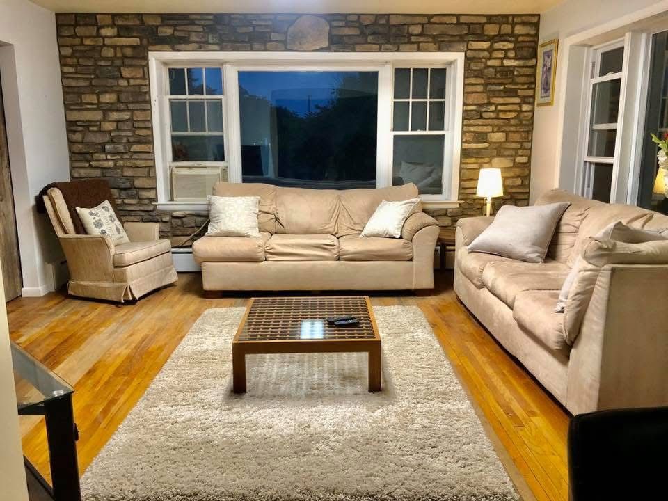 A living room with two couches and a coffee table