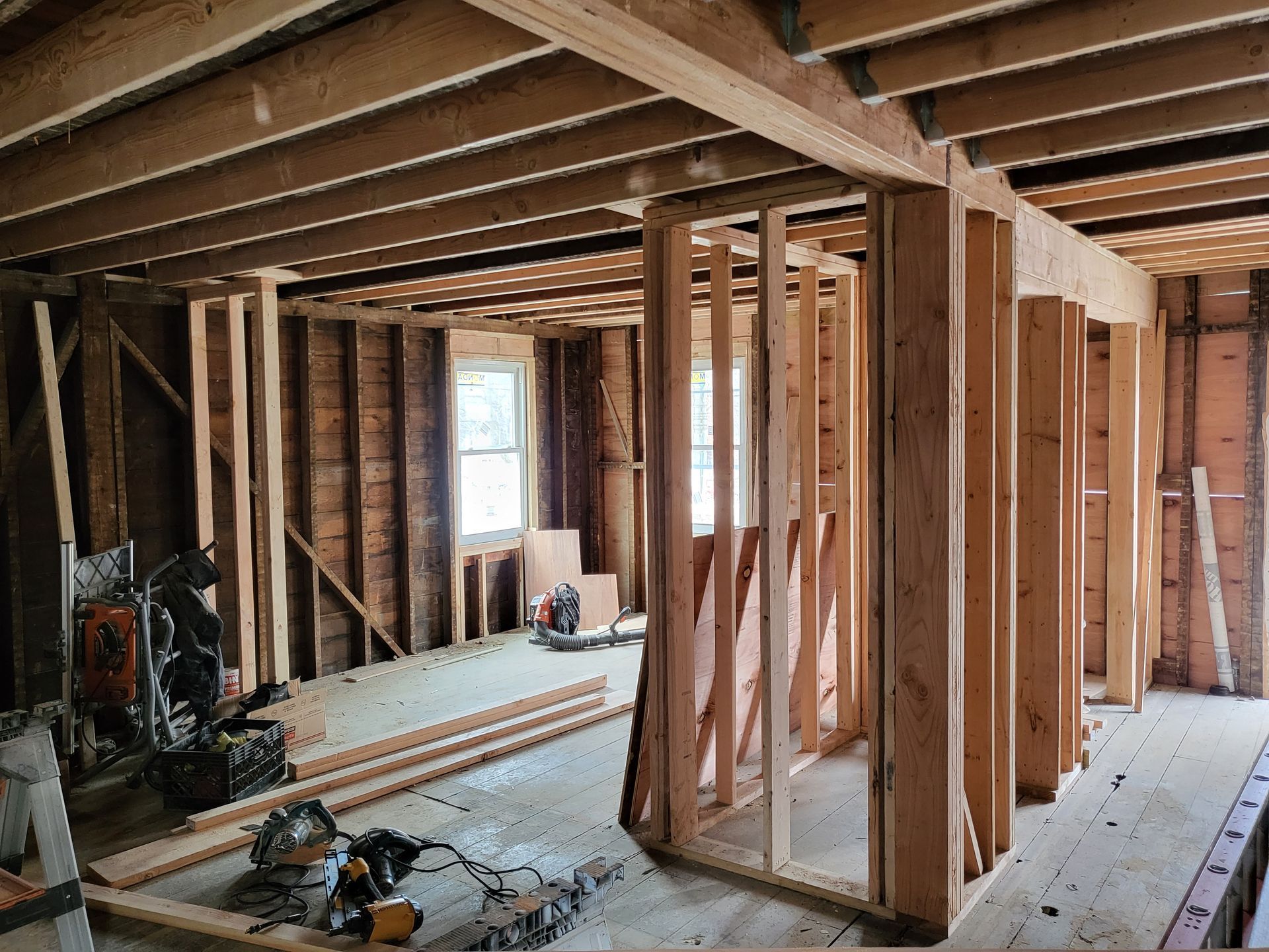the inside of a house being built with wooden beams