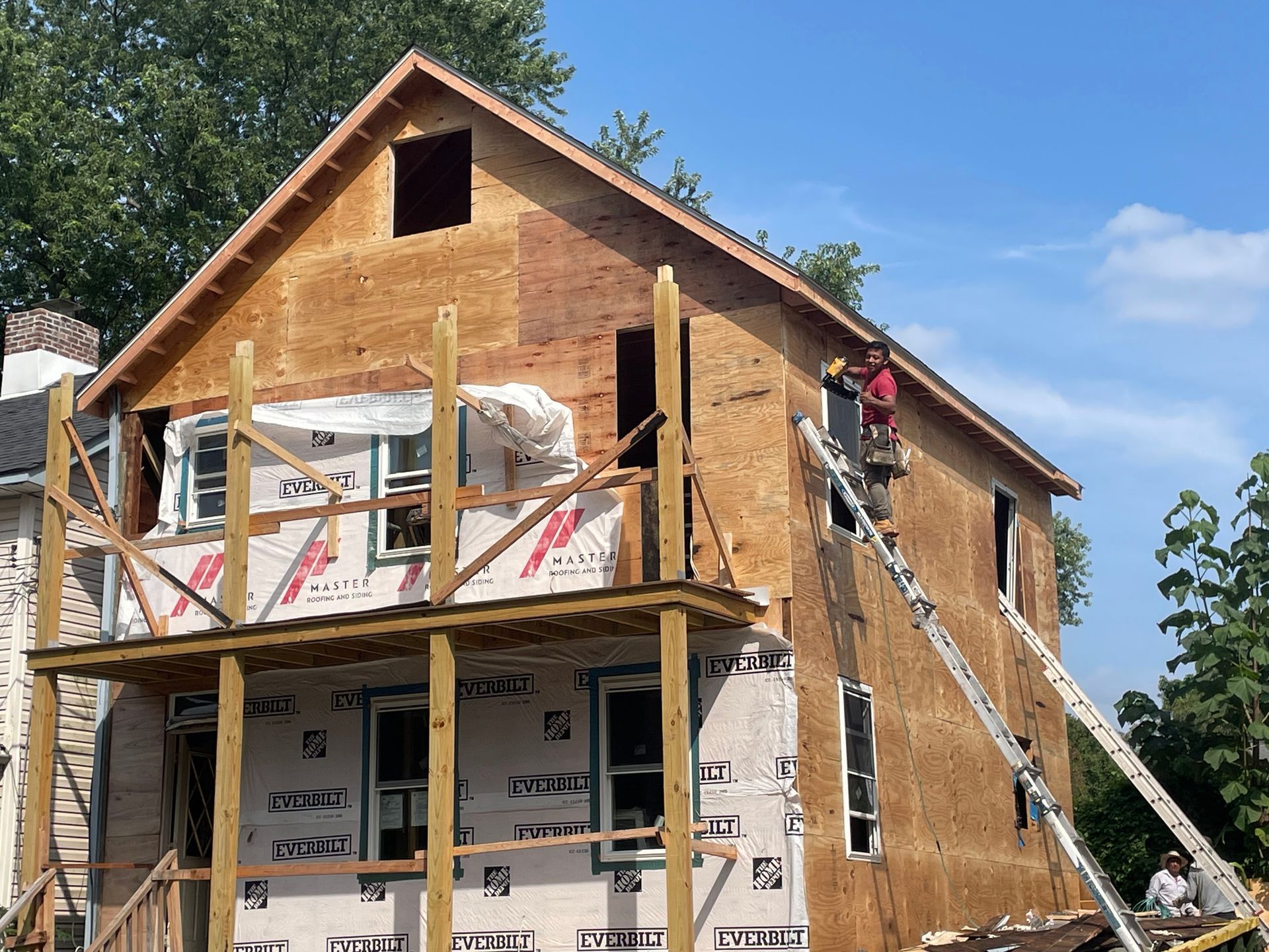 a house is being built with plywood and styrofoam
