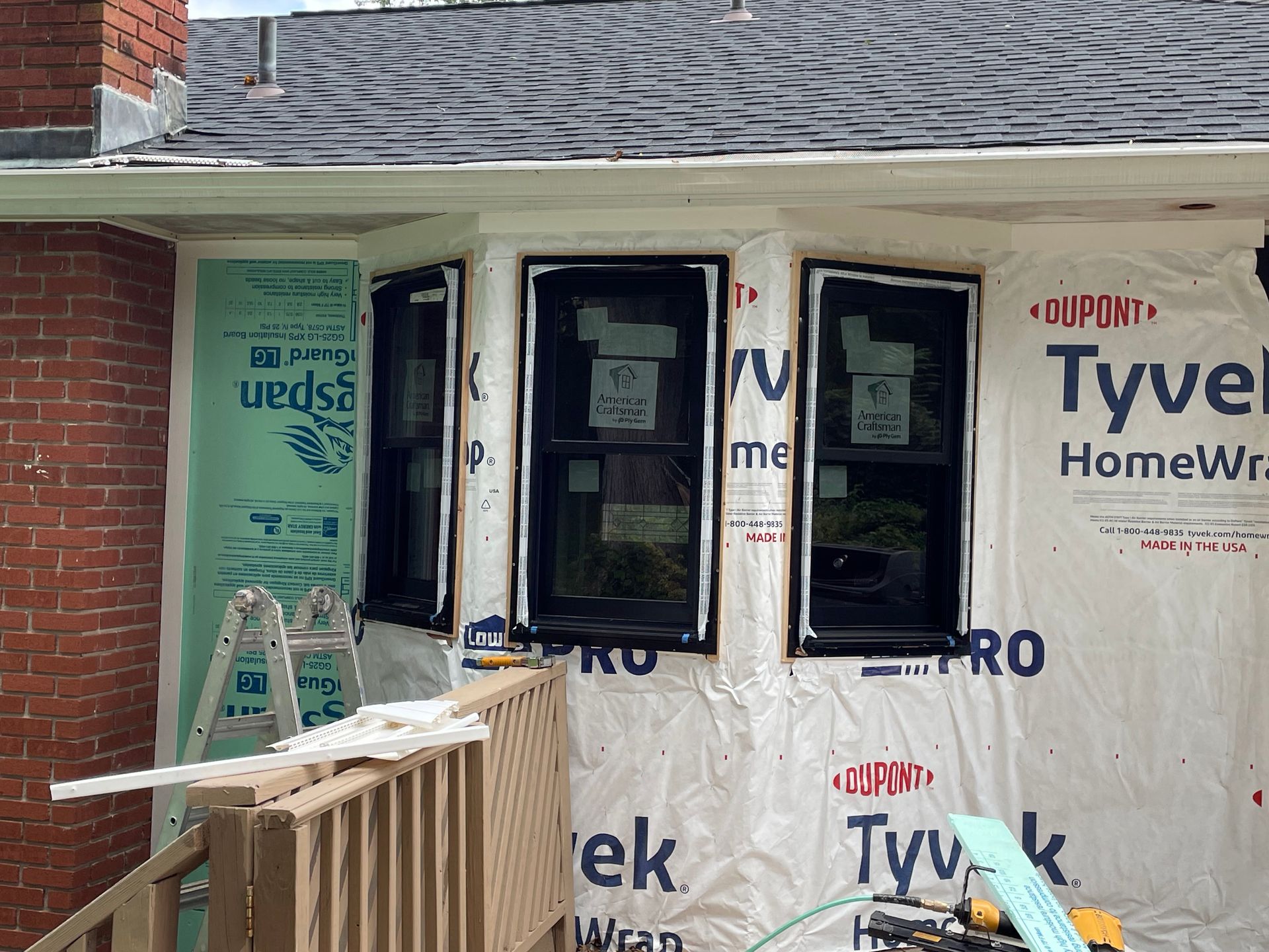 a house is being remodeled and the windows are being installed