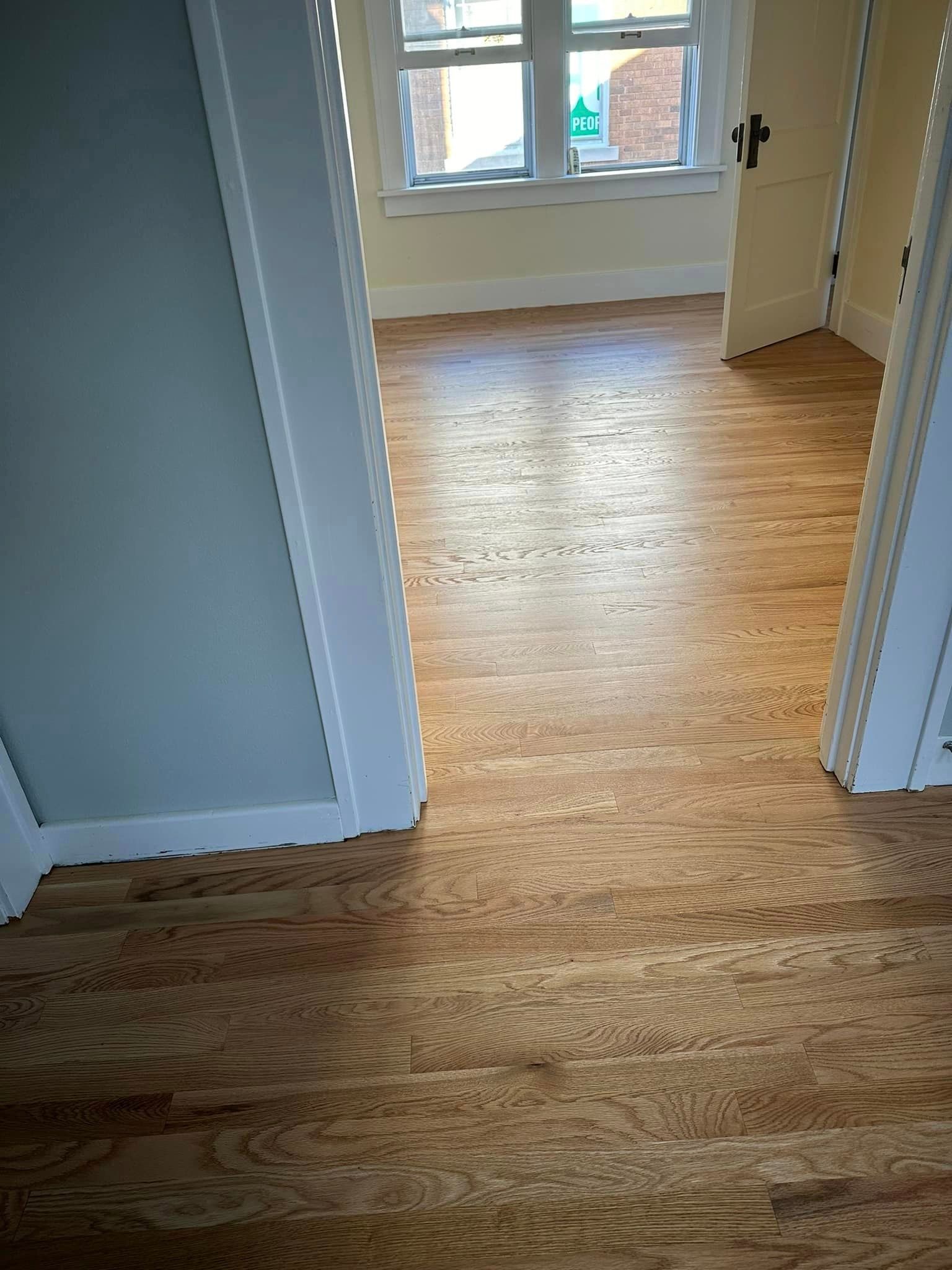 A room with hardwood floors.