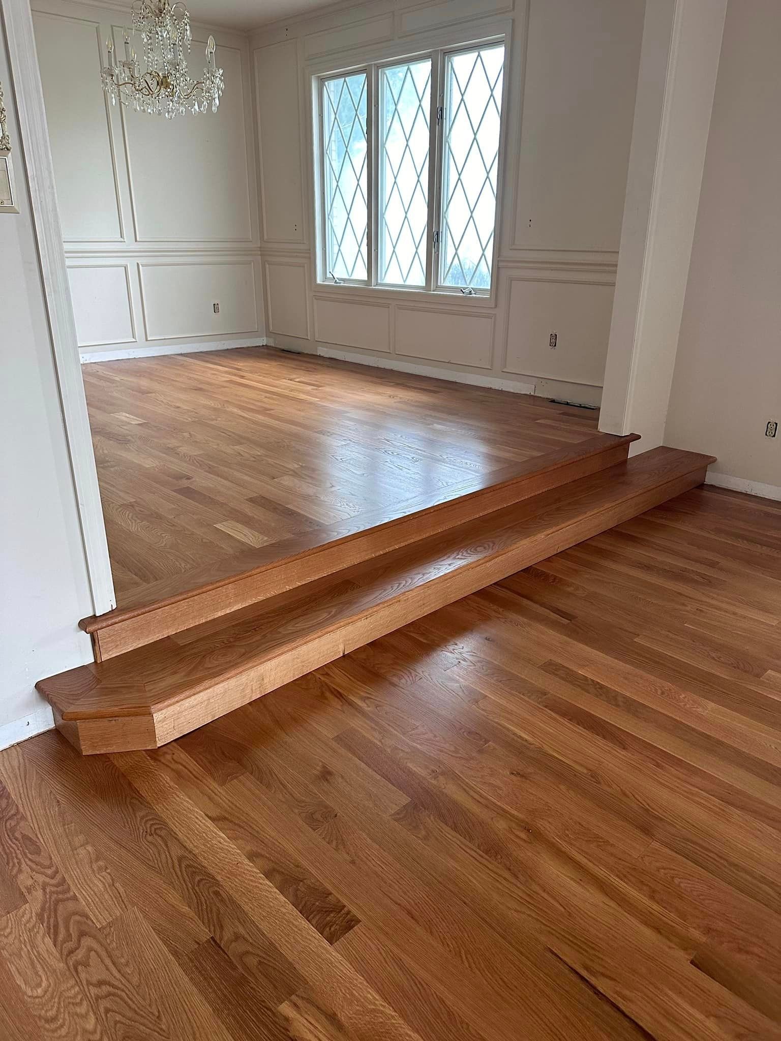 A living room with hardwood floors.