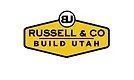 Logo of Russell & Co. Build Utah in a yellow hexagon, with a circular 
