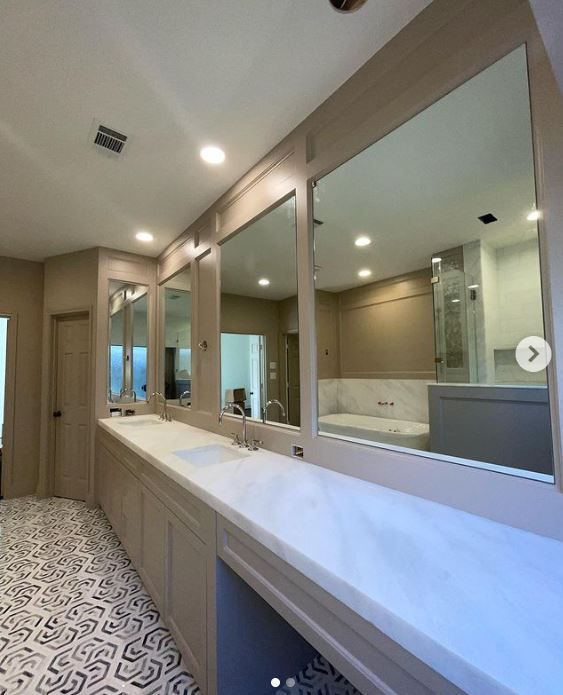 multiple bathroom mirrors
