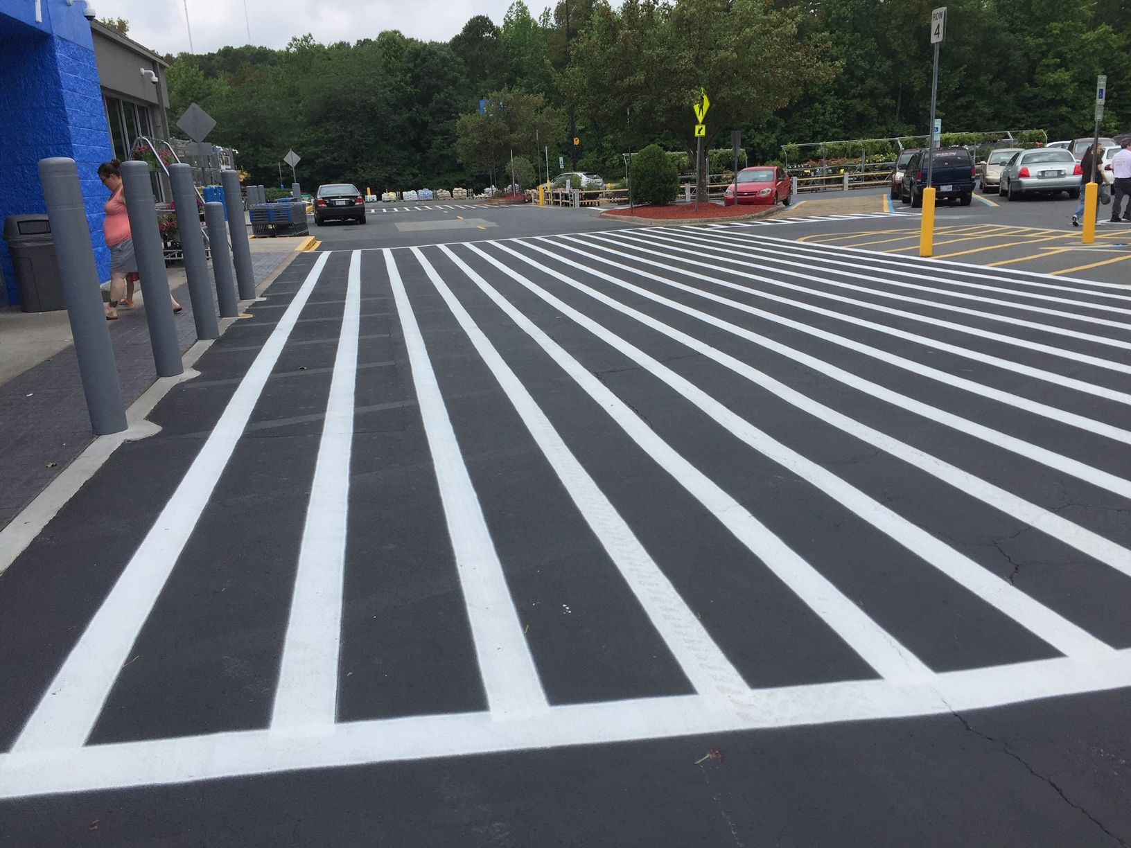 a parking lot with white stripes painted on it
